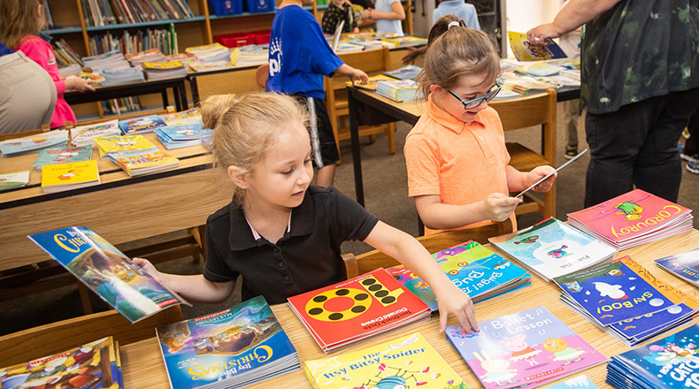 children selecting books