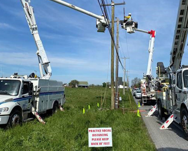 Linemen working on powerlines