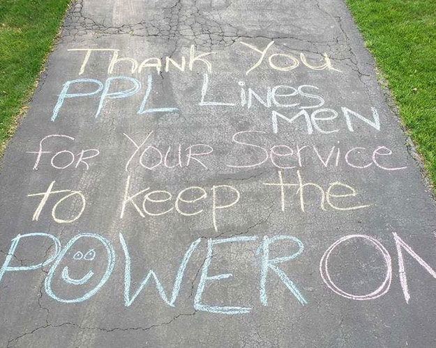 a thank you message with sidewalk chalk