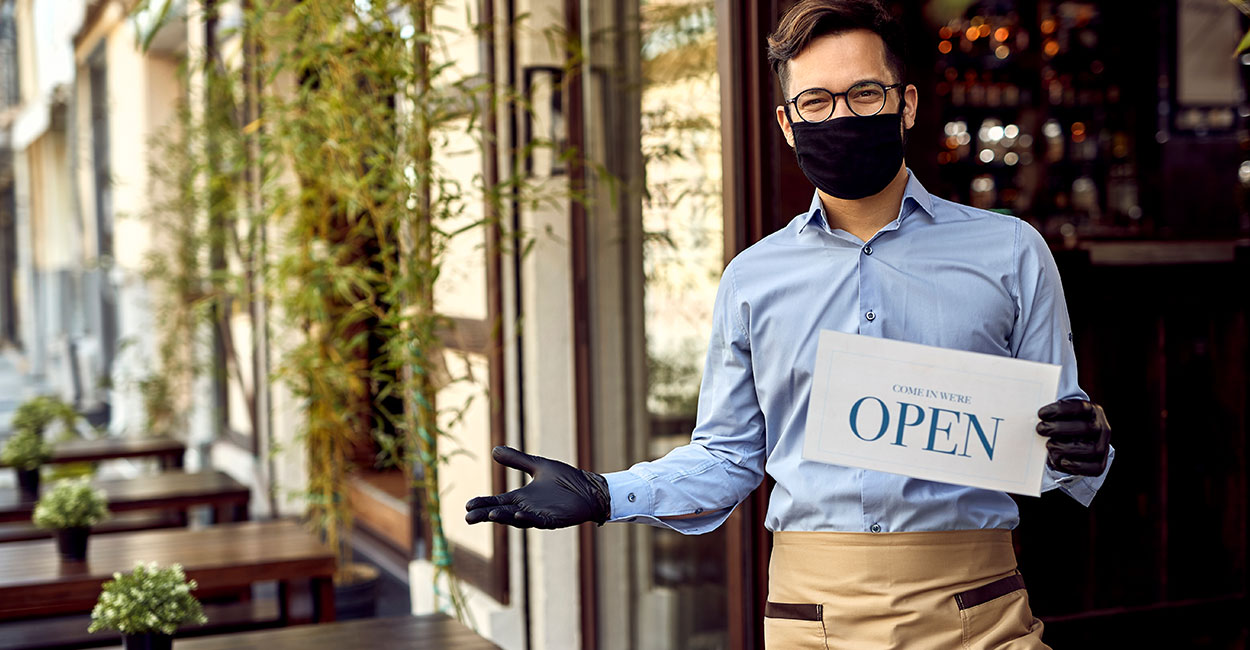 masked restaurant owner