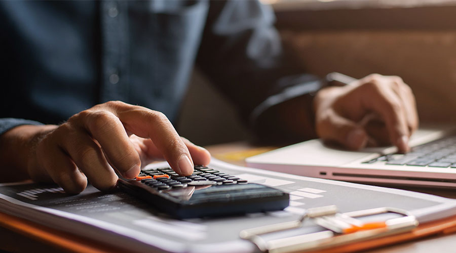 person using calculator