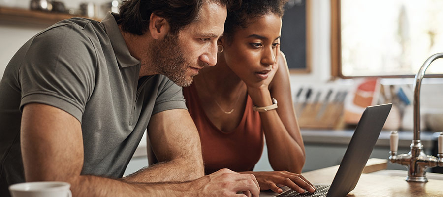 couple looking at laptop together