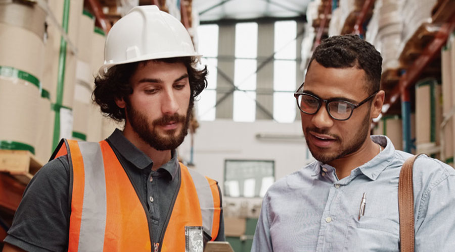 two men in warehouse